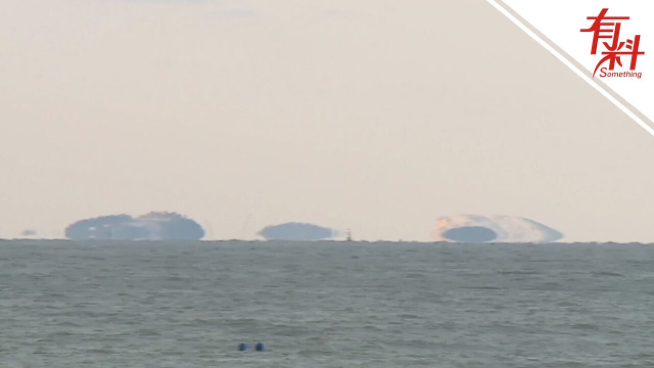 烟台蓬莱海面雪后现海滋奇观 海岛仿若海上雪山