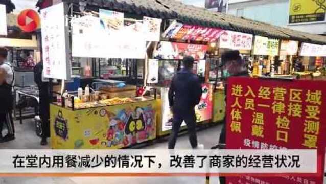 成都允许临时占道经营 现场直击:临街面馆将餐桌摆出门外