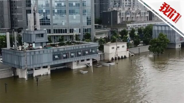 长江武汉关区域江水已高过城市主干道 防汛人员:已按历史最高水位筑堤