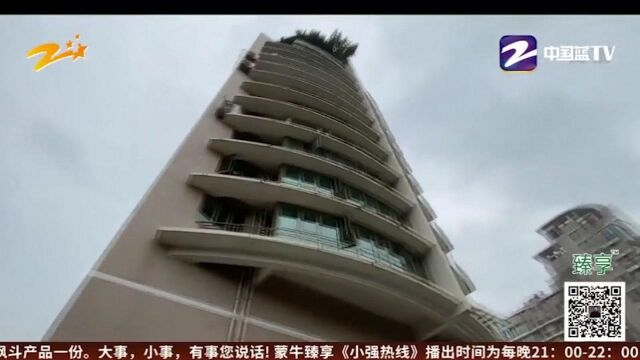 地下车库堆满衣服 公司说“办公” 业主说“仓库”