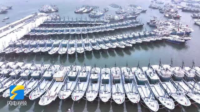 荣成成山头:白雪勾勒海岸 于天地咏画意