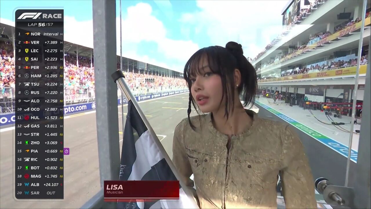 Lisa担任挥方格旗嘉宾 诺里斯冲线首冠全场沸腾