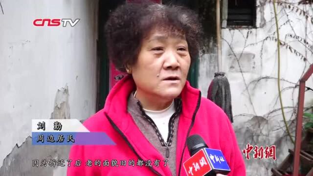 民间画家7年不辍墙绘百米武汉版“清明上河图”