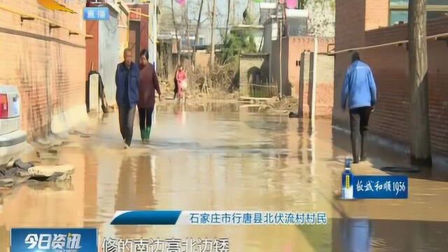 石家庄行唐:路面扒开没维修,道路积水出行难