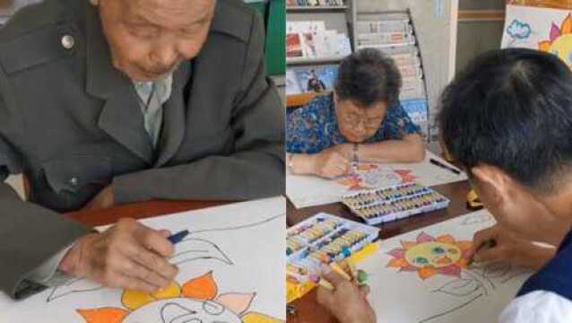 爷爷奶奶们在敬老院认真学习描画 一笔一划既认真又可爱