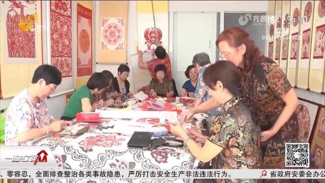 红红火火!社员平均年龄近60岁,潍坊这个剪纸社团巧手剪纸迎国庆