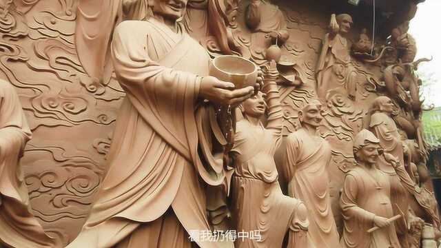 四川绵阳圣水寺!为何游客要往罗汉的法器里扔钱?这是怎么回事?