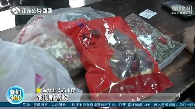 打包寄给亲人!炒货、桂花鸭……“爱”的快递礼轻情意重