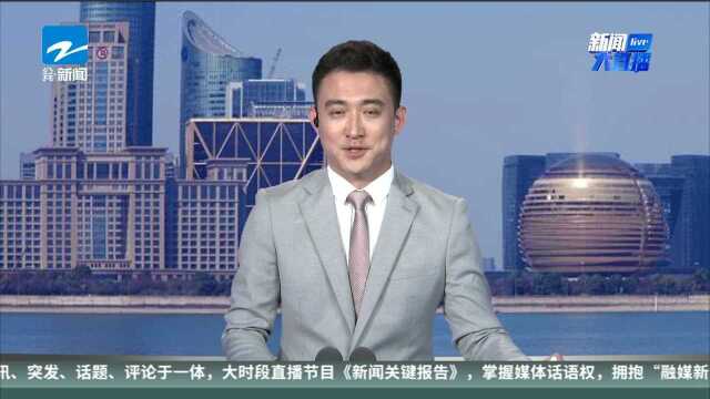 关注台风“米娜”:宁波慈溪——电线杆刮倒 特警顶风冒雨排险