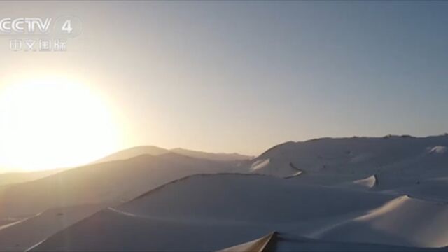 中央气象台发布大风蓝色预警和暴雪橙色预警,敦煌迎今冬首场降雪