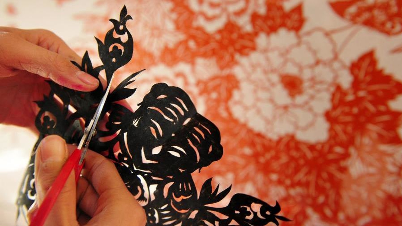 承载民族文化发展印记,手艺人道尽剪纸身后奥秘
