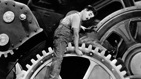 美国工厂流水线上的卓别林,已成为了一个有血有肉的拧螺丝机器人