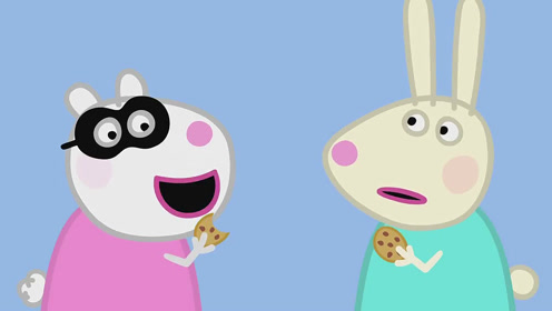 小羊苏西和小兔瑞贝卡正开心地吃着曲奇饼干,它们吃的非常香