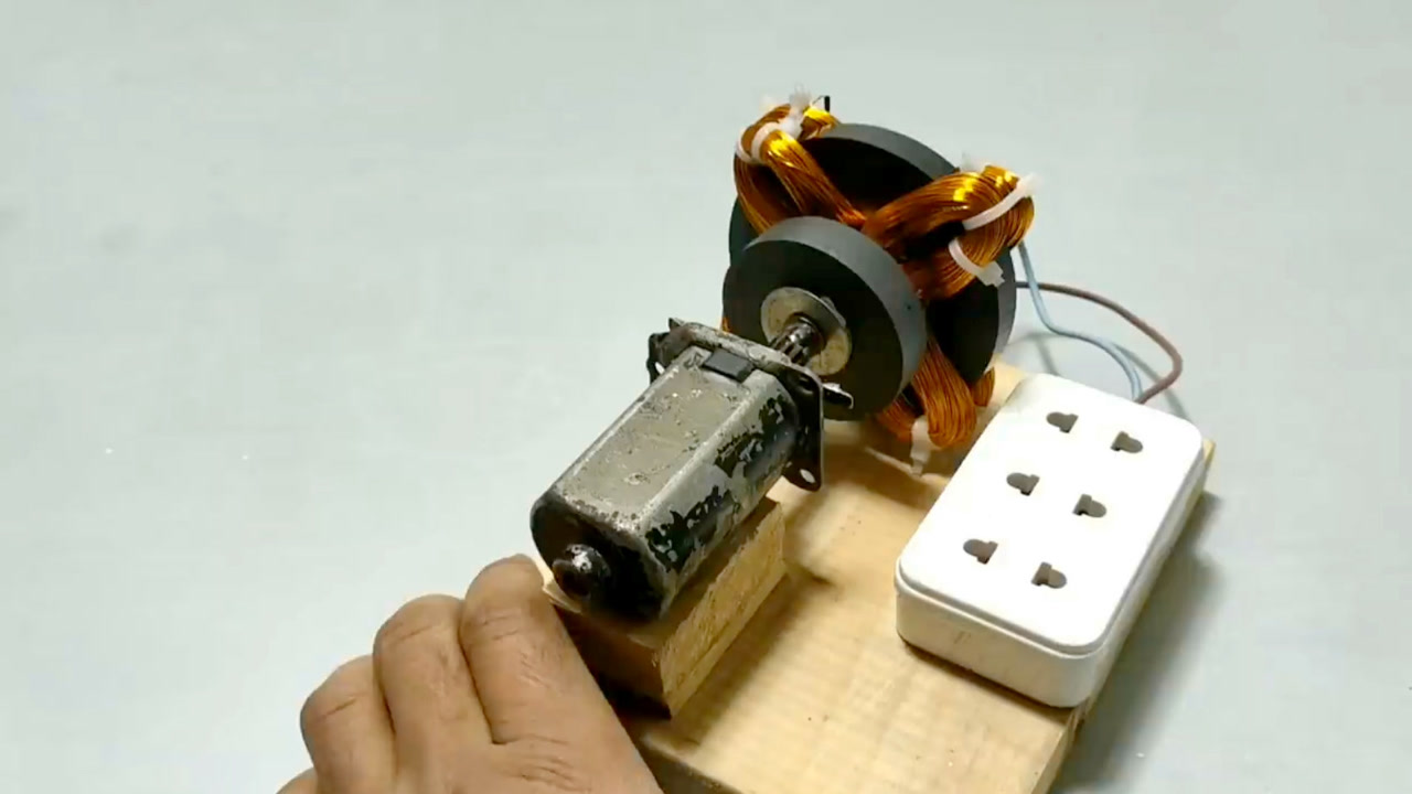 用磁铁缠绕铜线制作220v发电机