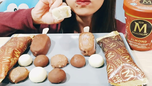 小姐姐吃梦龙雪糕,作为高端冰淇淋的代表,有种唯我独尊的风格