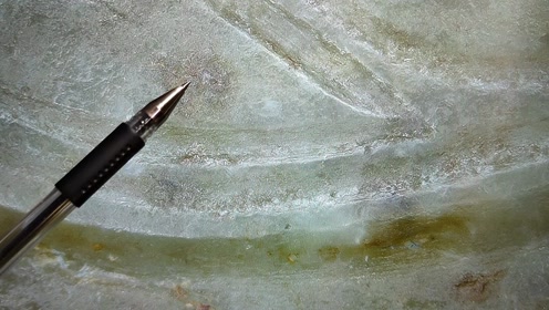 高古玉解玉砂痕迹特征明显,与仿品金刚砂痕迹有天壤之别