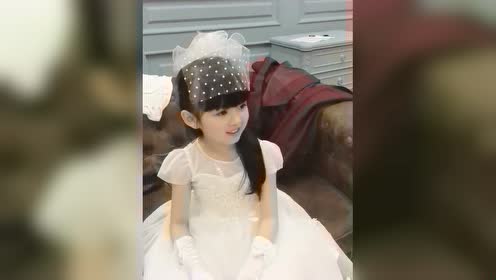 小女孩穿婚纱_小女孩穿婚纱头像
