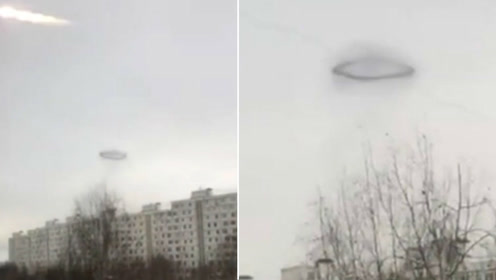 UFO？俄罗斯天空惊现神秘黑色圆环 周围黑雾环绕的图片