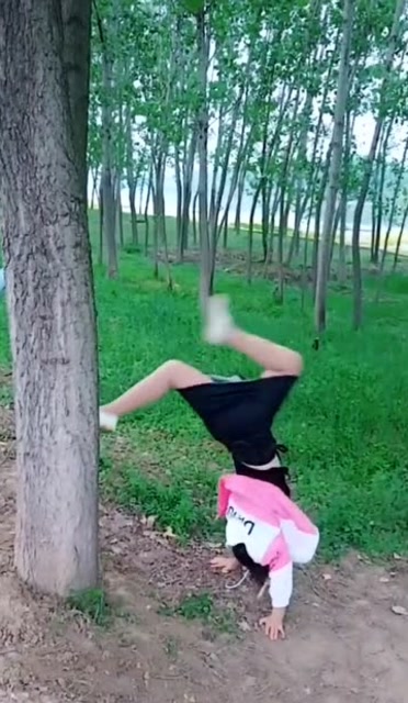 哎哟,发现个穿裙子倒立的,结果很意外