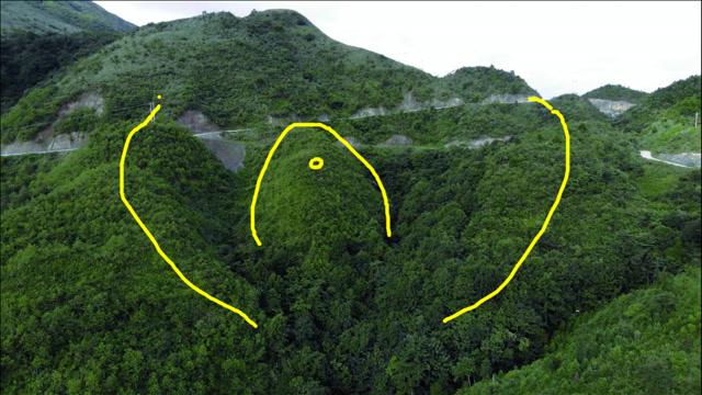 左右龙脉聚拢,中间凸起山包,一个山美水美的风水宝地