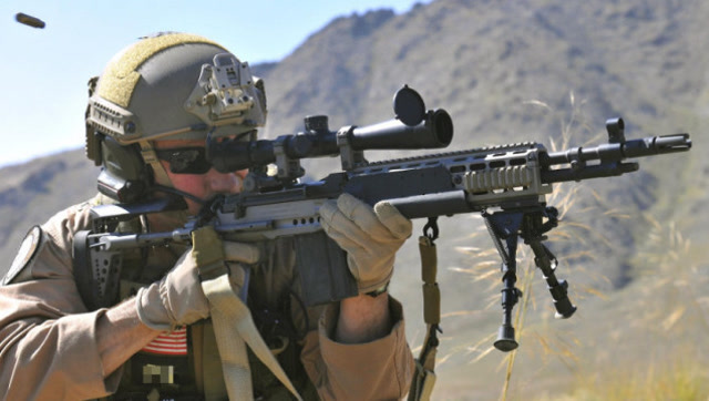 sbr子弹5.56mm 使用消声器的效果入木三分