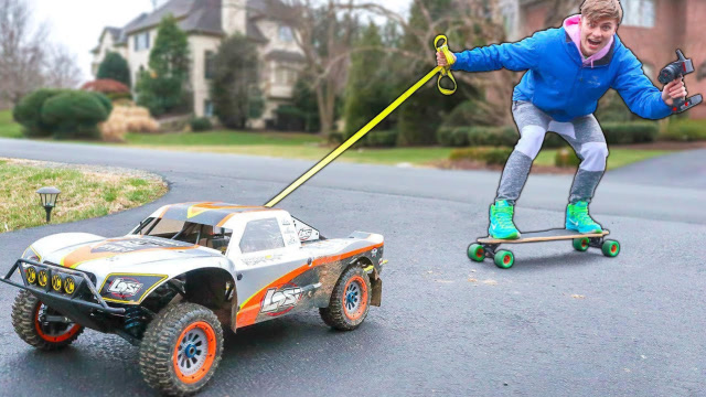 千万别小看rc玩具老外用它拖着自己玩滑板看动力花1万也值