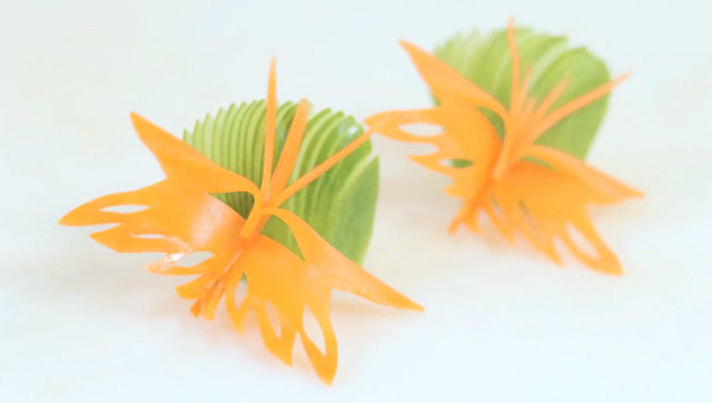 胡萝卜雕花另一种风格的胡萝卜蝴蝶装饰可爱美观