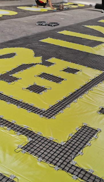 楼体外墙发光字 建筑墙体挂网字 地产工地围挡拉网字 楼盘网格发光字