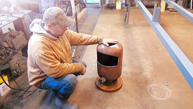 煤气罐改循环水取暖炉图片