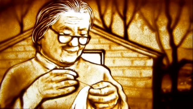 沙画:献给母亲节by张明聪