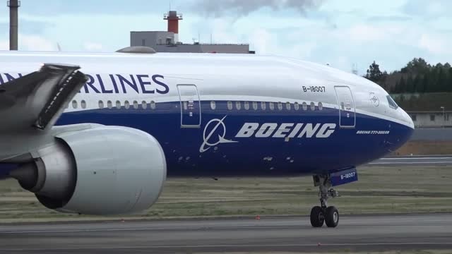 中国航空波音777300erb18007飞机从nrt34r跑道进场