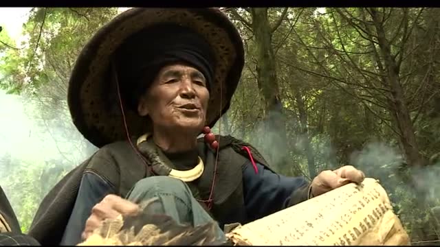 彝族文化 国家级毕摩绘画传承人 曲比阿伍