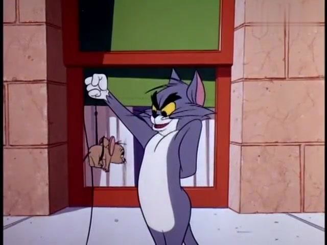 猫和老鼠:杰瑞被汤姆给抓了,汤姆阴险的笑,拿起一只大长号