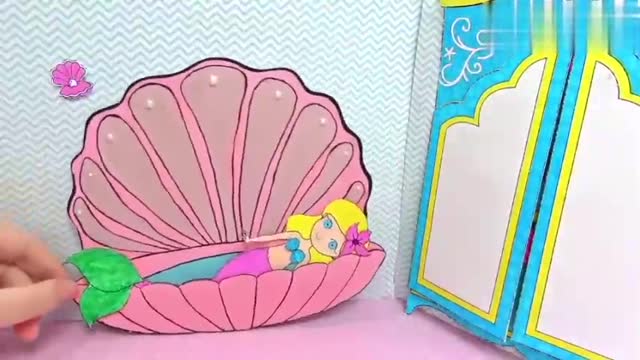 手工的小美人鱼的房间,衣柜里都是鱼尾,贝壳是床也是车