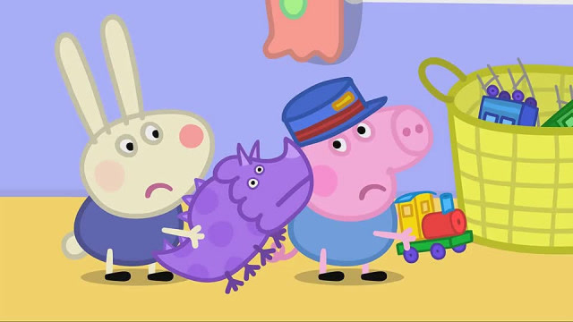 小兔理查德拿着三角龙先生,乔治则拿着他的小火车玩具