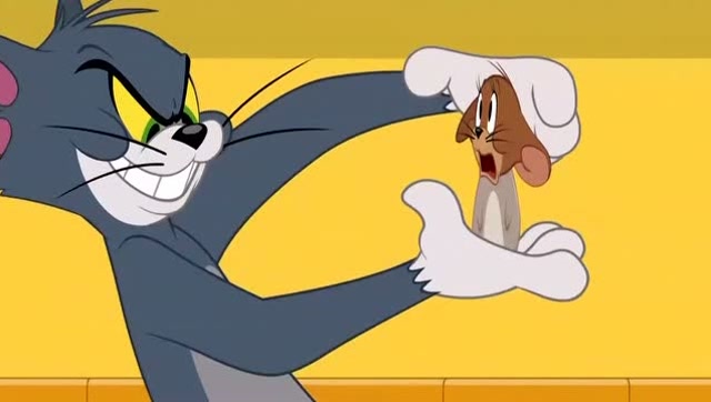 汤姆抓住杰瑞,被新来的看屋子的人逮住了