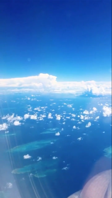 蓝到窒息的大堡礁上空,从7000米高空一眼望到海底的纯净,美翻了!
