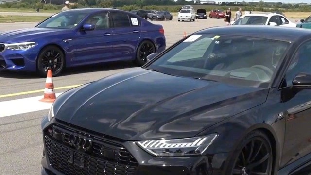 同样是西装暴徒,奥迪rs7 vs 宝马m5,差距一目了然!