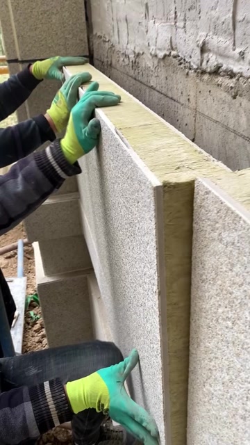 外墙保温装饰一体板真岩石安装施工