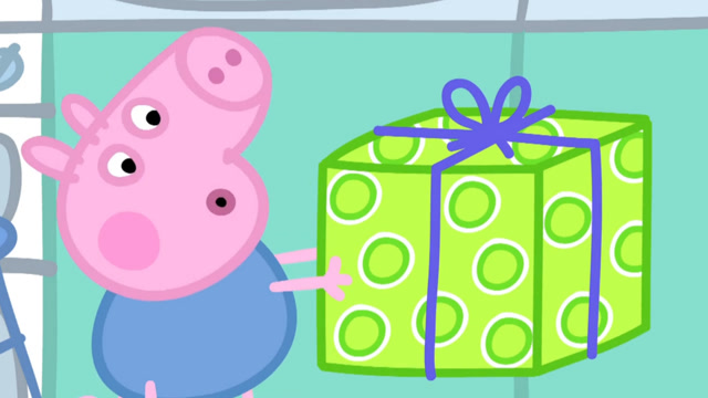 小猪乔治过生日了,乔治收到了一个很大的礼物
