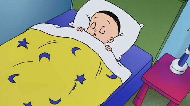 现在是晚上了,大头儿子早已经睡着了他好像在做梦
