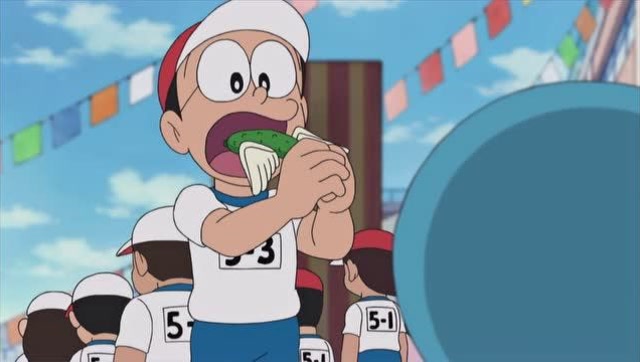 哆啦a梦:大雄吃了魔法小黄瓜,信心十足,等会肯定可以赢得比赛了!