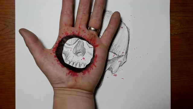 很酷的3d特技艺术 在手掌上画一个真实的洞