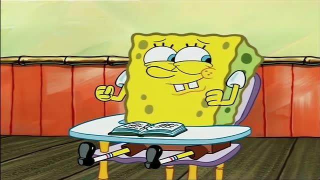 海绵宝宝高兴的把桌子当车子开