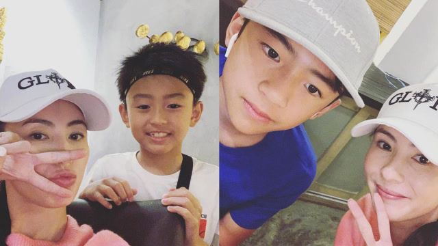 张柏芝与儿子合影画面温馨谢振轩腼腆帅气谢振南活泼可爱