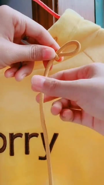 卫衣抽绳怎么系好看"蜻蜓结"