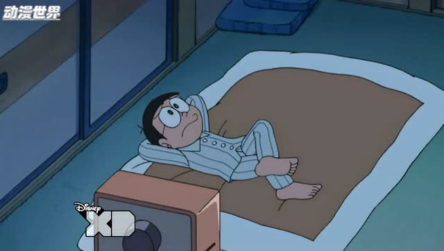 哆啦a梦:大雄躺在床上很无聊,他想看看静香在干什么.