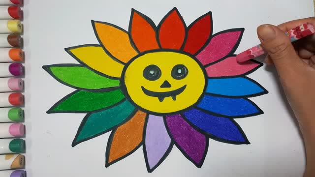 学习简笔画:画一朵万圣节花朵,给它的花瓣涂上彩虹色!