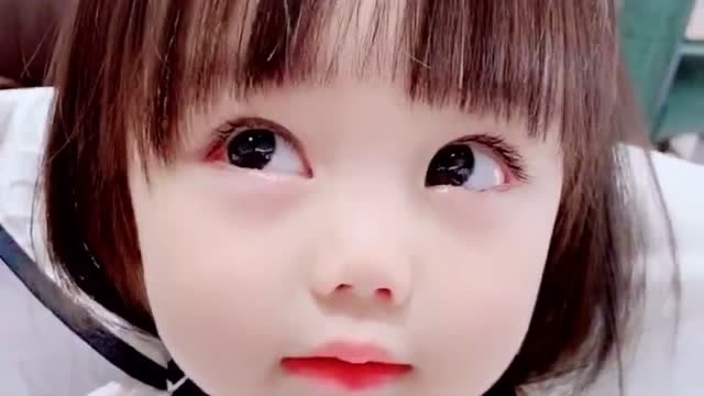 这闺女的大眼睛,水灵灵的,真漂亮!
