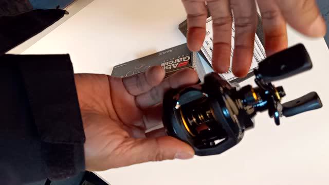 阿布abu水滴轮pmax3侧盖打开方式